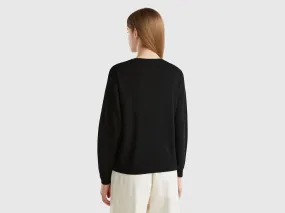 Boat neck sweater in pure Merino wool - Black | Benetton