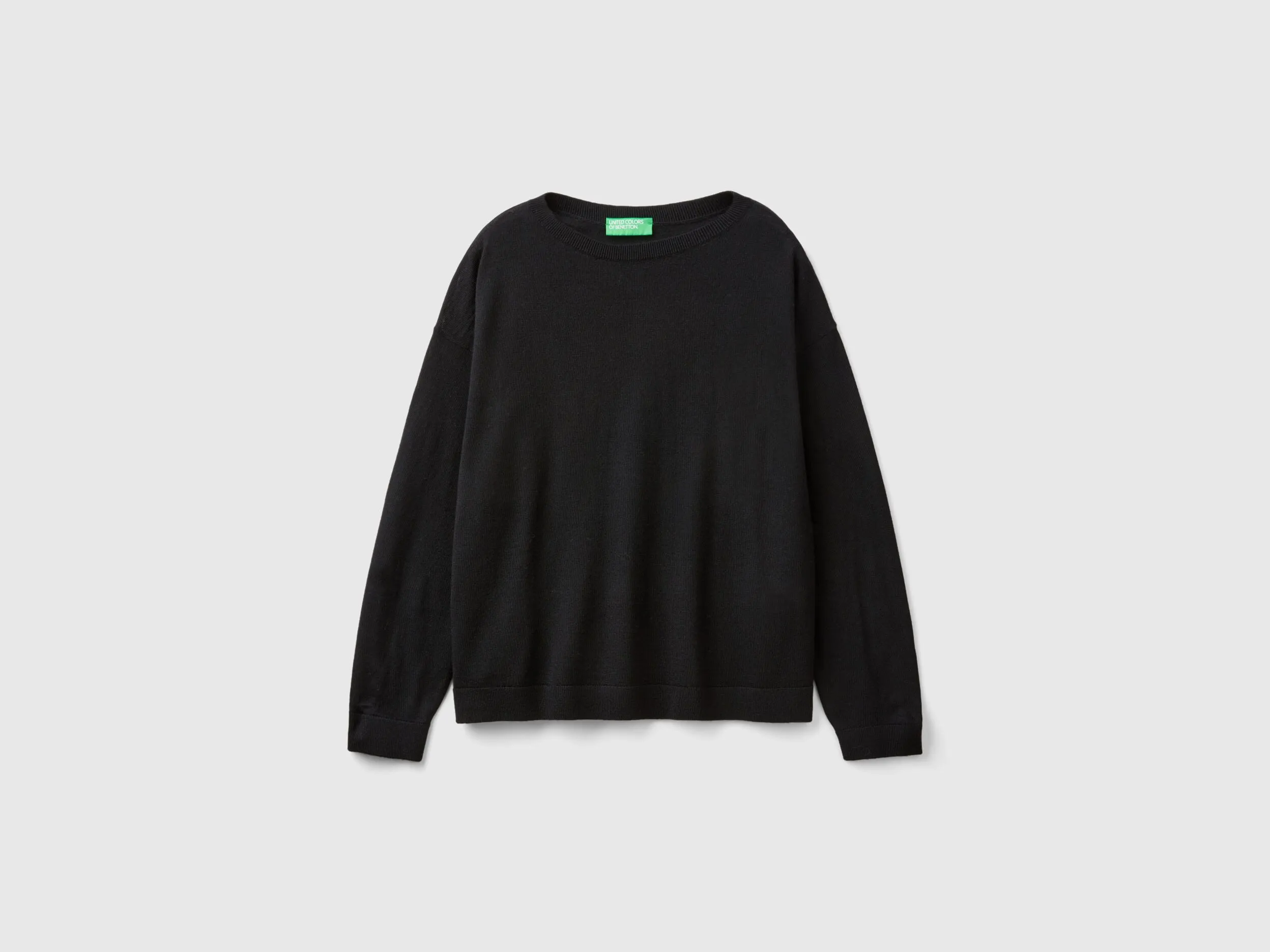 Boat neck sweater in pure Merino wool - Black | Benetton