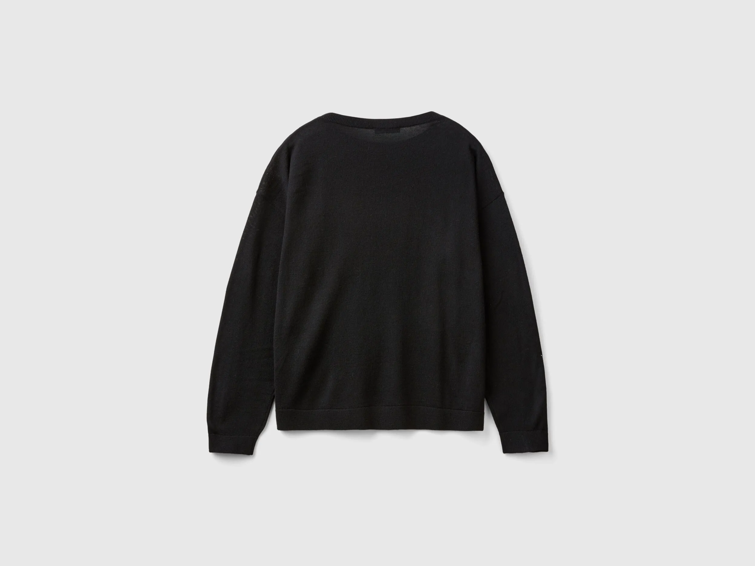 Boat neck sweater in pure Merino wool - Black | Benetton