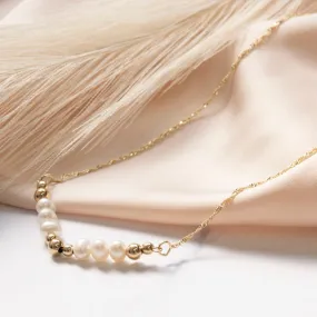 Yellow gold choker necklace with gold and pearl set